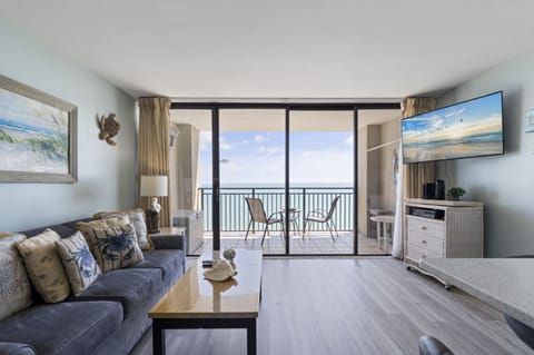 Signature Condo, 1 Bedroom, Balcony, Ocean View | Living room | 42-inch TV with cable channels