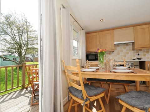 Fridge, electric kettle, cookware/dishes/utensils