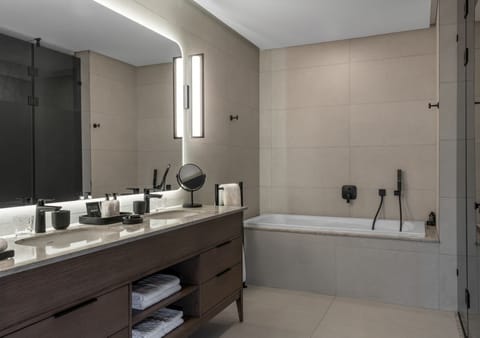 Junior Studio Suite | Bathroom | Hair dryer, slippers, towels, soap