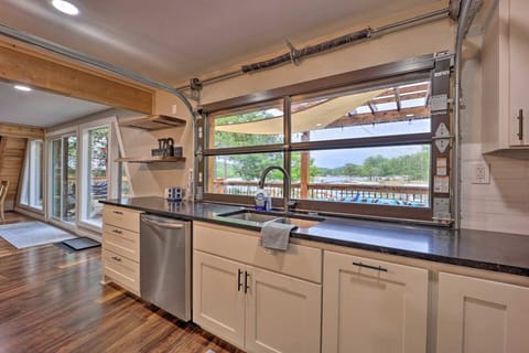 Kitchen garage door open to deck