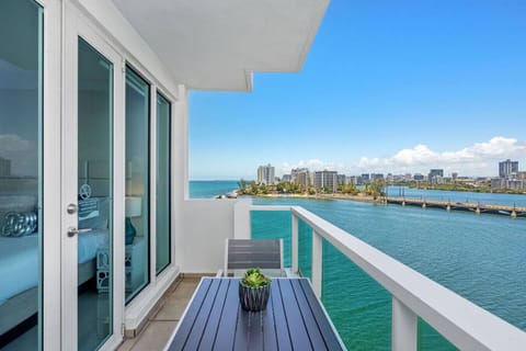 Relax on the balcony with stunning water and city views.