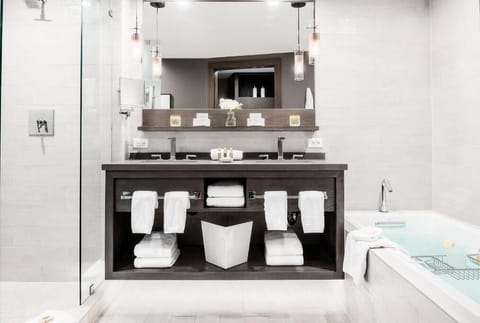 Designer toiletries, hair dryer, bathrobes, slippers