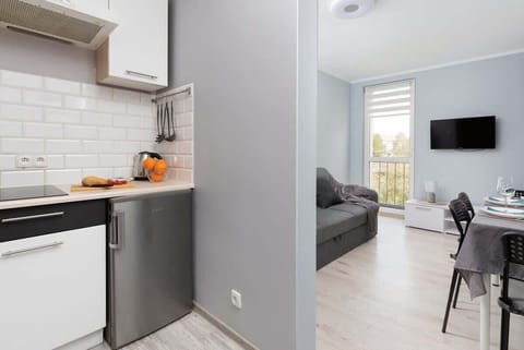 Another angle of the kitchen, highlighting the compact yet functional layout.
