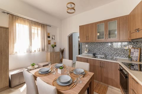 Fully equipped kitchen with dining setup

