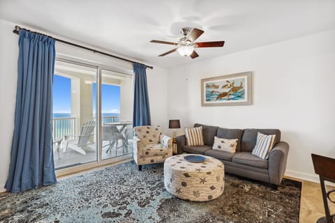 Relax in this coastal living room with ocean views and comfortable seating.