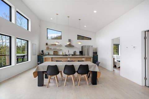 Upstairs: With a dining table for 8 and bar seating for 4, there's a spot for everyone to enjoy meals in.