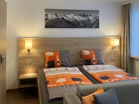 Property, Furniture, Picture Frame, Comfort, Wood, Bed Frame, Textile, Orange, Interior Design, Lamp