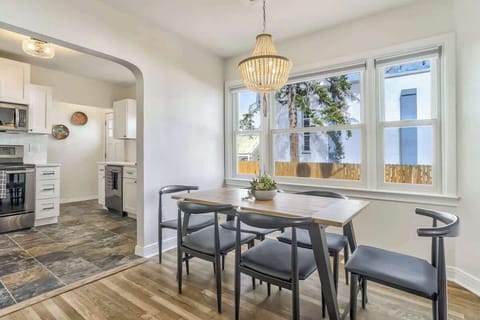 Unit A: Circle around for home-cooked food or delicious takeout around table with plenty of open light flowing in!