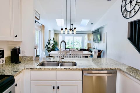 View from kitchen over the beautifully natural lit living space