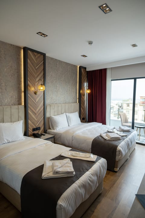 City Triple Room | Premium bedding, down comforters, Select Comfort beds