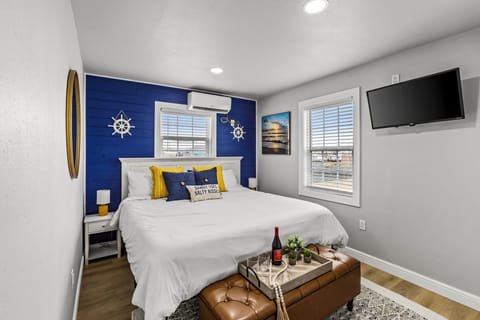 Bedroom Retreat: Beachy vibes in a stylish room with vibrant decor and views!