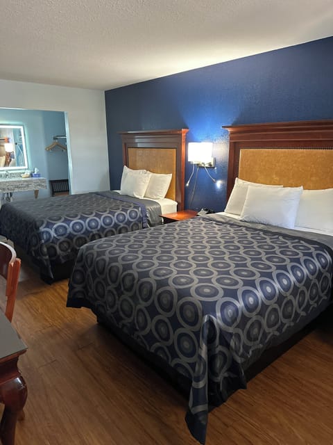 Deluxe Double Room, 2 Queen Beds | Iron/ironing board, free WiFi, bed sheets