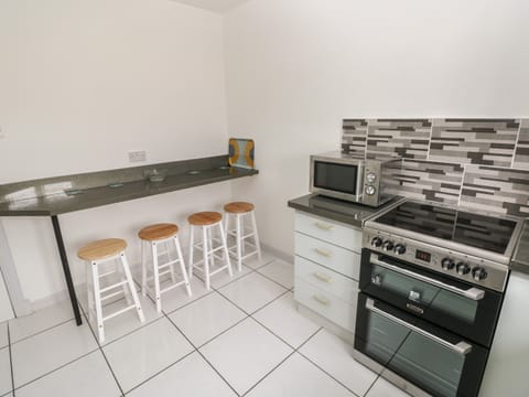 Fridge, electric kettle, toaster, cookware/dishes/utensils