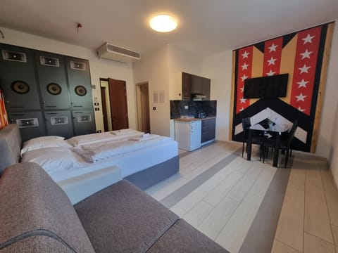 Standard Studio, 1 Bedroom, Non Smoking | Living area | 43-inch Smart TV with digital channels, TV