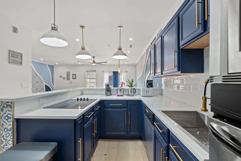 Luxury Townhome | Private kitchen | Full-size fridge, microwave, oven, dishwasher