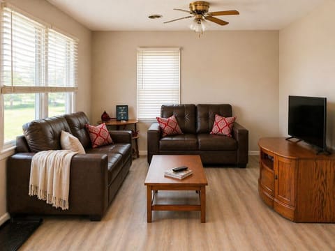 Bright, comfortable living room with seating for relaxing together