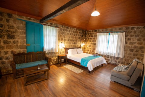 Luxury Suite, Garden View | Hypo-allergenic bedding available, down comforters, minibar