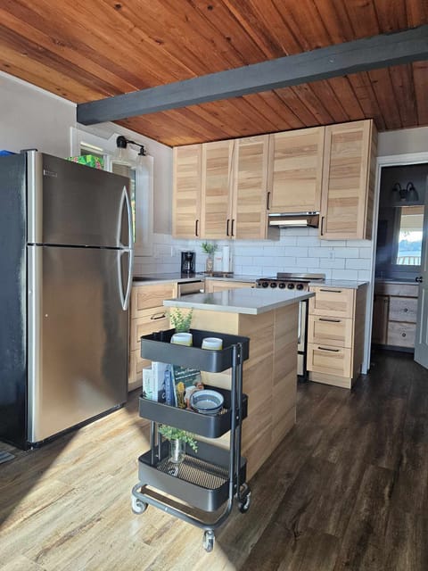 kitchen - open to the living room with a view while you cook!