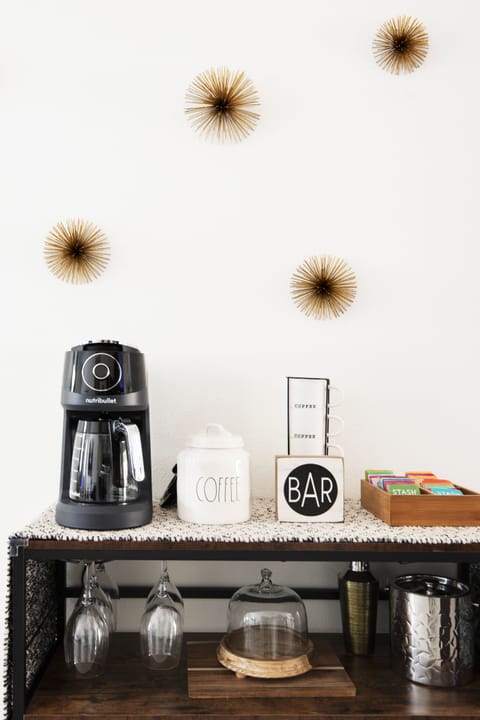 Fully stocked tea and coffee, wine glasses, cocktail mixers
Hot water maker