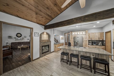 An open kitchen design allows for seamless conversation and connection.