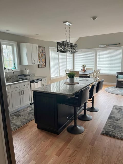 Head upstairs to the main living level, into the open living plan