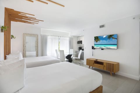 Family Suite, 2 Bedrooms, Kitchen | Down comforters, in-room safe, soundproofing, iron/ironing board