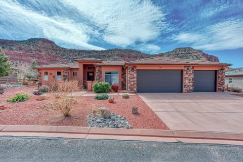 Welcome to your modern Southern Utah retreat with stunning red rock cliffs right outside your door.