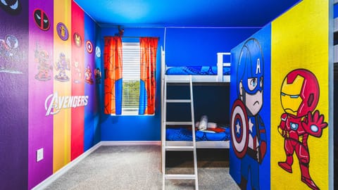 Hero-themed bunk room with bold colors, fun decor, and adventure-filled vibes.