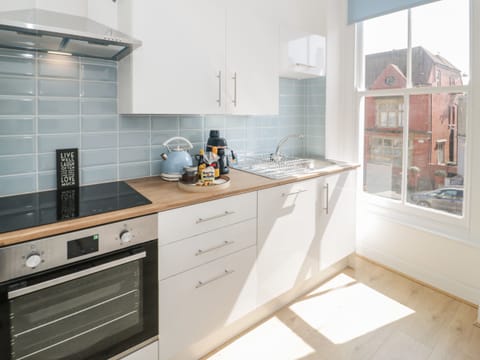 Fridge, dishwasher, electric kettle, toaster