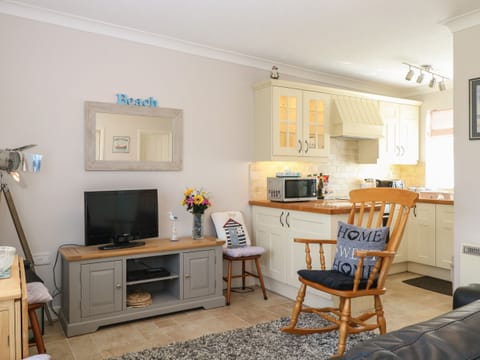 Fridge, electric kettle, toaster, cookware/dishes/utensils
