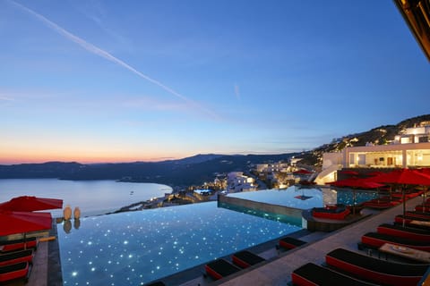 Seasonal outdoor pool, pool umbrellas, sun loungers
