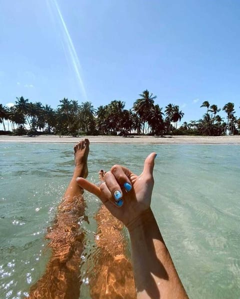 On the beach, beach towels, fishing