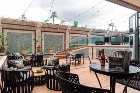 Outdoor pool, open 10:00 AM to 10:00 PM, pool umbrellas, sun loungers