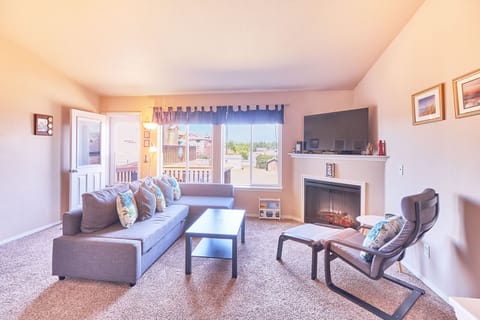 Living Room - Nice flat screen TV perfect for movie nights - couch converts to a queen sized bed