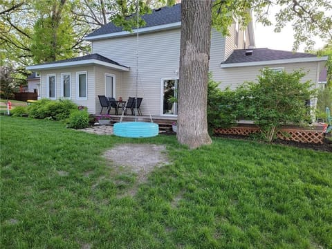 tire swing for the kids, outdoor dining on the patio and large yard for games