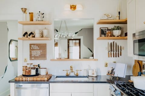 This modern kitchen surrounded by 1800’s charm is as beautiful as it is functional.  The ideal space for foodies, weekend chefs, or experienced take out-ers! 