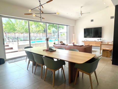 Dining room with sitting up to 8 people. This area has a 4 panel slider.