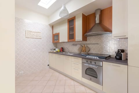 Villa | Private kitchen | Fridge, oven, stovetop, dishwasher