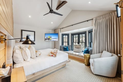Suite Interior: King bed, day bed, 55” Smart TV, bluetooth speaker, humidifier,  seating areas