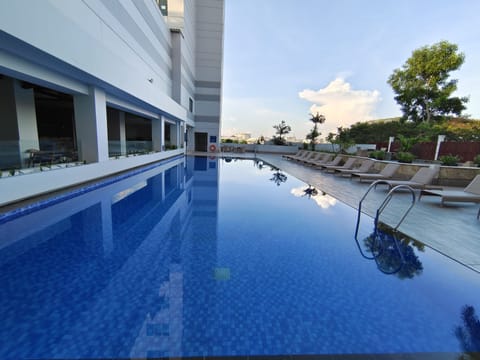 Outdoor pool, open 6:00 AM to 6:00 PM, sun loungers