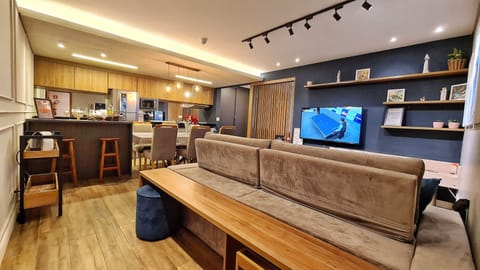 Design Apartment | Living area | 55-inch LED TV with digital channels