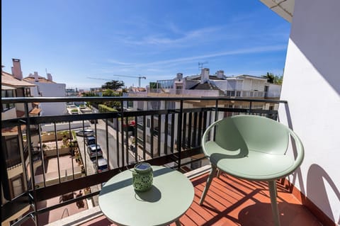 A sunny private balcony made for slow mornings and fresh-air breaks, with open neighbourhood views from your Parede stay. #PrivateBalcony #CoastalStay #OutdoorLiving #Portugal #pt #parede