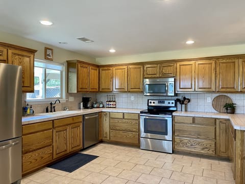 Fully stocked kitchen for easy meal prep.