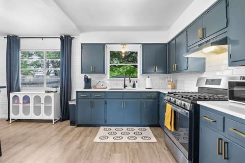 Enjoy family meals or casual snacks in this well-appointed kitchen with plenty of natural light.