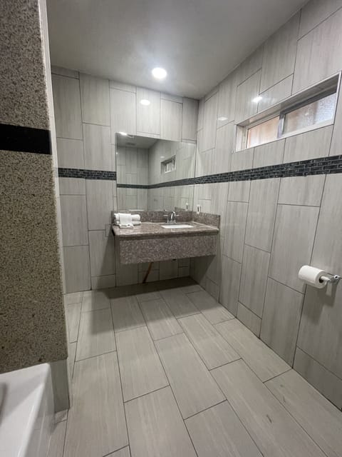 Separate tub and shower, jetted tub, towels