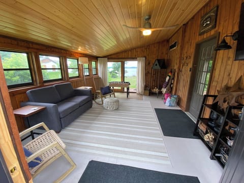 Spacious 3 season porch with views out to the lake.  
