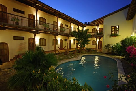 Outdoor pool, open 10:00 AM to 10:00 PM, sun loungers