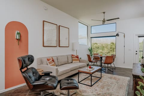 Spacious living area with majestic views, beautiful light, and high ceilings