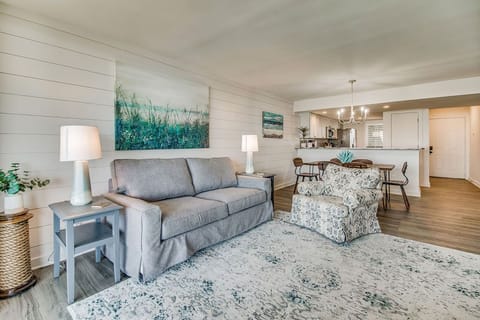 Open living space with tile flooring perfect for beach life at Wind Drift Orange Beach condo