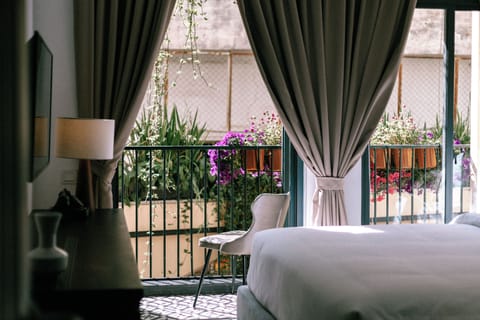 Small double room with balcony | Laptop workspace, blackout drapes, iron/ironing board, free WiFi